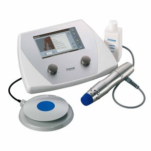 The handheld Zimmer enPuls Radial Pulse Therapy treatment system for pain and tendinitis including plantar fasciitis and tennis elbow. 